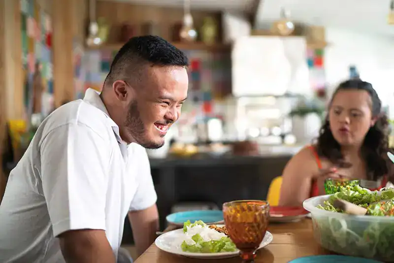 Empowering Weight Loss: A Comprehensive Guide for Individuals with Disabilities 2 Image of a disabled man and balance around nutrition to aid weight loss Solihull