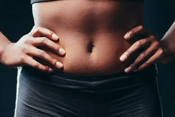 Toning Your Stomach: The Ultimate Guide to Achieving a Sculpted Stomach While Shedding Pounds 1 Image of a toned stomach after non surgical treatment Solihull